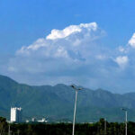 A mesmerizing view of the federal capital with clouds hovering over the mountains