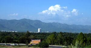 A mesmerizing view of the federal capital with clouds hovering over the mountains
