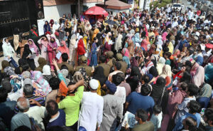 A large number of students gather outside LCWU Jail Road to participate in the medical entrance test (MCAT).