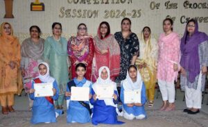 Prize winners of English Speech Competition organised by Federal Directorate of Education pose for group photo with Principal Prof Shugufta Rauf at Model College for Girls G10/2.