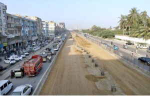 A view of the development work of Red Line is underway with the help of heavy machinery at University Road in the Provincial Capital.