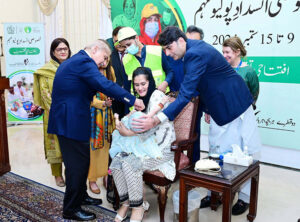Prime Minister Muhammad Shehbaz Sharif administering polio vaccination to children to kicks tart countrywide Special Anti-Polio Campaign