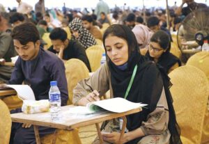 Students are solving their question papers during Pre entry test for admission at the Liaquat University of Medical & Health Sciences (LUMHS).