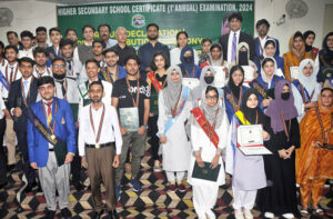 Commissioner Maryam Khan is awarding medals to position holder students during the result declaration ceremony of the intermediate examination at the Board of Intermediate and Secondary Education.