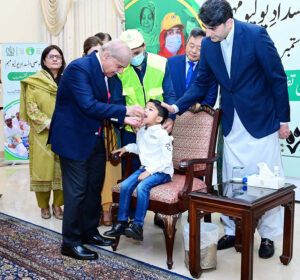 Prime Minister Muhammad Shehbaz Sharif administering polio vaccination to children to kicks tart countrywide Special Anti-Polio Campaign