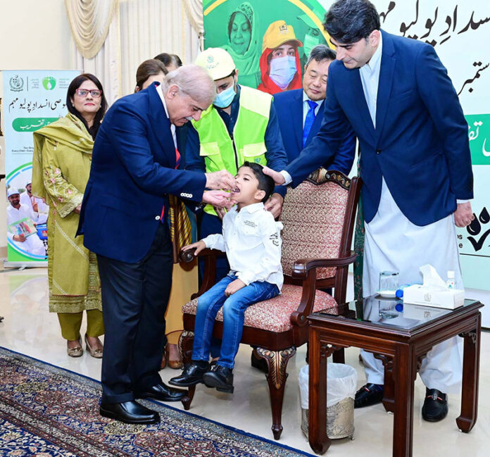 Prime Minister Muhammad Shehbaz Sharif administering polio vaccination to children to kicks tart countrywide Special Anti-Polio Campaign