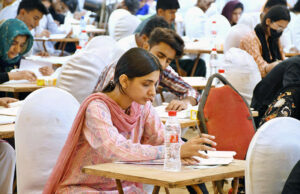 Students are solving their question papers during Pre entry test for admission at the Liaquat University of Medical & Health Sciences (LUMHS).