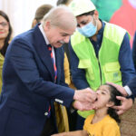 Prime Minister Muhammad Shehbaz Sharif administering polio vaccination to children to kicks tart countrywide Special Anti-Polio Campaign