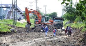 Heavy machinery being used for the repair of Pandora Link Road in the Federal Capital
