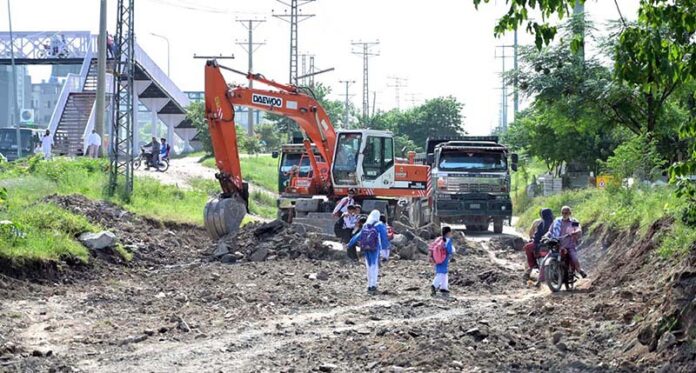 Heavy machinery being used for the repair of Pandora Link Road in the Federal Capital