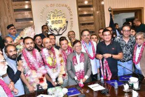Group Leader Etihad Founder Sheikh Riazuddin and Majid Raza Bhatta pose for a group photograph with the newly elected Chamber of Commerce Officials for 2024-26.