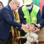 Prime Minister Muhammad Shehbaz Sharif administering polio vaccination to children to kicks tart countrywide Special Anti-Polio Campaign