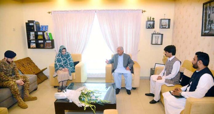 Federal Minister for Industries and Production Rana Tanveer Hussain visited the family of Lt. Col. Asif Ali Awan Shaheed