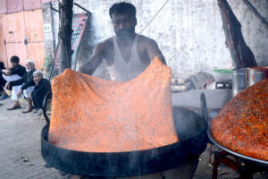 A vendor displaying (Katlama) to attract the customers on roadside