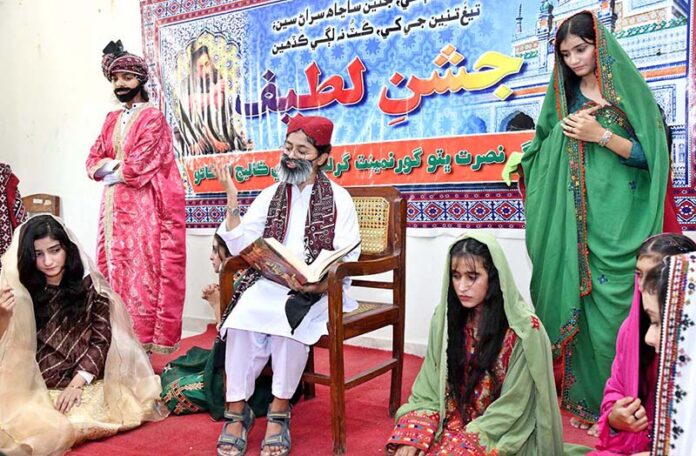 Students performing in a tableau during Jashne e Lateef Function at Begum Nusrat Bhutto Government Girls Degree College