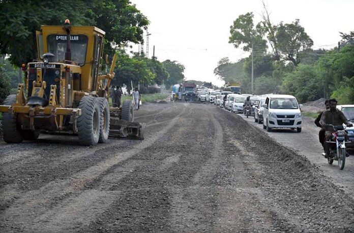 Heavy machinery is being used as construction work on Club Road is underway during development work in the Federal Capital
