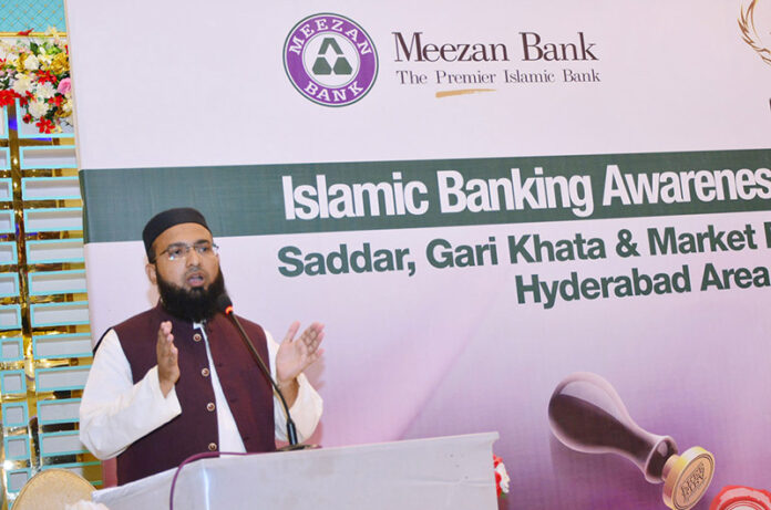 Mufti Abdul Dayaan addressing during Islamic banking awareness seminar organized by Meezan bank at local hall