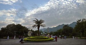 An attractive view of clouds hovering over the city while people visiting the picnic spot Daman e Koh in the federal capital.