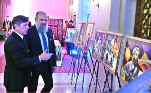 Federal Minister for Commerce Jam Kamal Khan along with Oybek Usmanov, Ambassador of Uzbekistan to Pakistan viewing photos during a ceremony celebrating the 33rd Anniversary of the Independence Day of the Republic of Uzbekistan