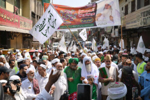 Pir Syed Inayat Ali Shah & devotees release pigeons on the occasion of Eid Milad-un-Nabi (SAWW) celebrations outside at Milad house