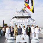 President Asif Ali Zardari in a group photo with senior military officials and crew of Pakistan Navy Ship Hunain during its induction ceremony
