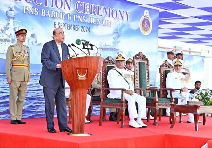 President Asif Ali Zardari addressing the induction ceremony of Pakistan Navy Ships Babur and Hunain at Pakistan Navy Dockyard