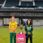Pakistan Women cricket team Captain Fatima Sana and South Africa Women cricket team Captain Laura Wolvaardt pose with the Three T20 series trophy at Multan Cricket Stadium