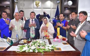 The newly elected office bearers of the Chamber of Commerce, President Ikramul Haque, are offering dua on the occasion of assuming charge after the AGM.