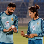 Pakistan Women cricket team bowling coach Junaid Khan giving tips to the Pakistan women team bowler Diana Baig during net practice session for the upcoming three T20 series against South Africa Women cricket team at Multan Cricket Stadium