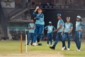 Pakistan Women cricket team bowling coach Junaid Khan giving tips to the Pakistan women team bowler Diana Baig during net practice session for the upcoming three T20 series against South Africa Women cricket team at Multan Cricket Stadium
