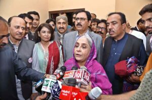 Sindh Minister for Health and Population Welfare Department Dr. Azra Fazal Pechuho addressing during the first SMBBMU International Conference on Family Planning " Way Forward For A Sustainable World" at Chandka Medical College auditorium Hall.