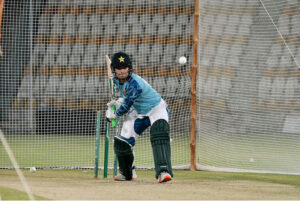 Pakistan Women cricket team bowling coach Junaid Khan giving tips to the Pakistan women team bowler Diana Baig during net practice session for the upcoming three T20 series against South Africa Women cricket team at Multan Cricket Stadium