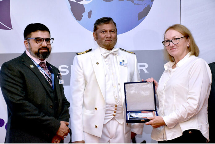 Sarah Mooney, Deputy High Commissioner of the British High Commission, receives a memento during the World Maritime Day seminar organized by DEMP and MTI at a local hotel