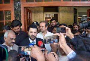 Parliamentary Secretary for Information and Broadcasting Barrister Danyal Chaudhry talking to media after visited Asfandyar Bukhari District Hospital to inquire after the police personnels injured during the protest of a political party.