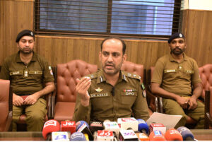 DPO Dr. Asad Ejaz Malhi addresses a press conference on the progress of Sargodha police over the past eight months at the DPO Office.
