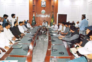 Deputy Commissioner Zaheer Anwar Jappa addresses a meeting focused on combating the dengue virus.