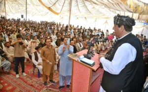 Federal Minister for State and Frontier Regions (SFRON) and Kashmir Affairs Engineer Amir Muqam addressing at Afghan Refugees Camp in Saranan area of Pishin district during his visit.