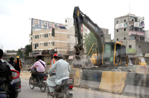 A view of the development work of Red Line is underway with the help of heavy machinery at University Road in the Provincial Capital.