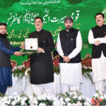 Chairman Senate, Syed Yousuf Raza Gilani handing over awards to winners of the competition in different categories at "Seerat-un-Nabi conference"