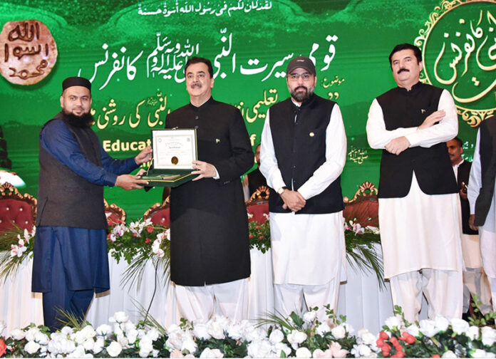 Chairman Senate, Syed Yousuf Raza Gilani handing over awards to winners of the competition in different categories at 