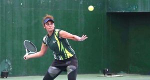 Tennis player Ushna Suhail in action in final of ladies singles during Khawar Hayat Memorial National Ranking Tennis Championship 2024 at PTF Tennis Complex.