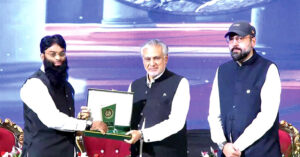 Deputy Prime Minister and Foreign Minister Ishaq Dar and Minister for Religious affairs and inter-faith Harmony Chaudhary Salik Hussain distributing certificates and shields among winners of Naat and Qirat competition