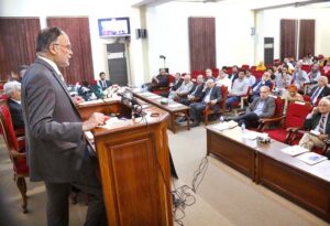 Federal Minister for Planning, Development and Special Initiatives, Prof. Ahsan Iqbal, addressing a symposium on "Climate Change and Health Development Consequences in Pakistan at the Pakistan Academy of Sciences.