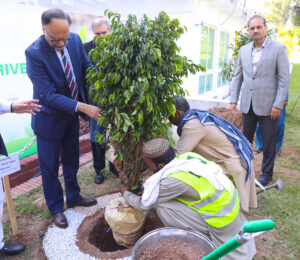 Federal Minister for Planning Ahsan Iqbal planting a tree at the Ministry of Planning, reinforcing Pakistan's commitment to a greener, sustainable future under the UGPP initiative.