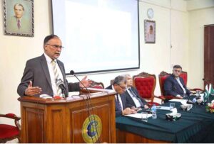 Federal Minister for Planning, Development and Special Initiatives, Prof. Ahsan Iqbal, addressing a symposium on "Climate Change and Health Development Consequences in Pakistan at the Pakistan Academy of Sciences.