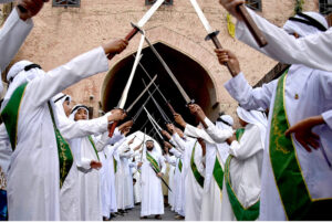 Youngsters in Arabic costumes participating in a procession to celebrating the birthday of Prophet Muhammad (PBUH)