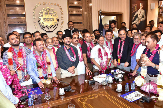 Group photo of the winners of the Associate Class Mambers of the Chamber of Commerce Election Year 2024-26 with Group Leader Etihad Founder Sheikh Riazuddin, President Chamber Abdul Ghafoor Malik