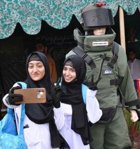 On Pakistan Defense Day, people exploring the military heritage of the country by visiting the exhibition at the Army Museum .