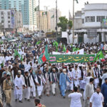 A large number of people participate in the main procession of Eid Milad-un-Nabi (SAW) celebrations at M.A Jinnah road Numaish chowrangi