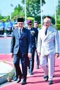 Prime Minister Shehbaz Sharif and Prime Minister of Malaysia Dato' Seri Anwar Ibrahim arriving for delegation level talks at the Prime Minister's House.